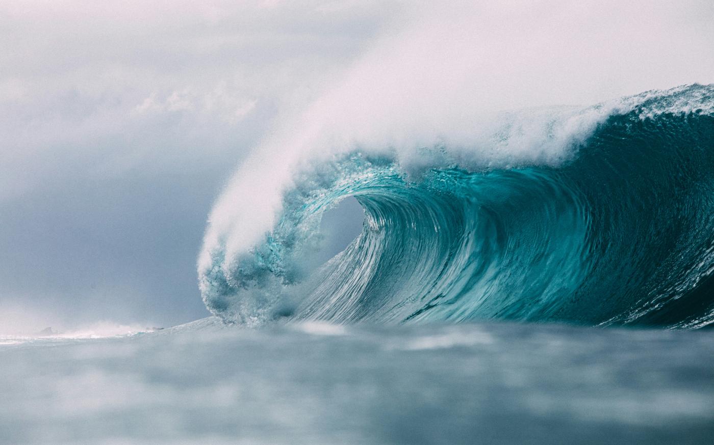white and blue ocean waves by Matt Paul Catalano courtesy of Unsplash.