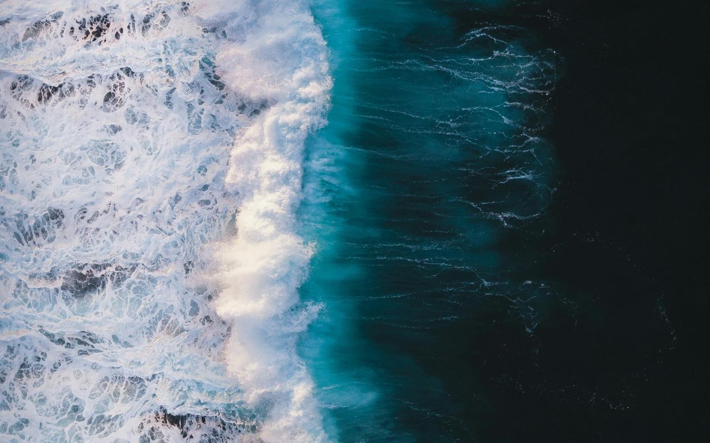 aerial view of sea by Ivan Bandura courtesy of Unsplash.