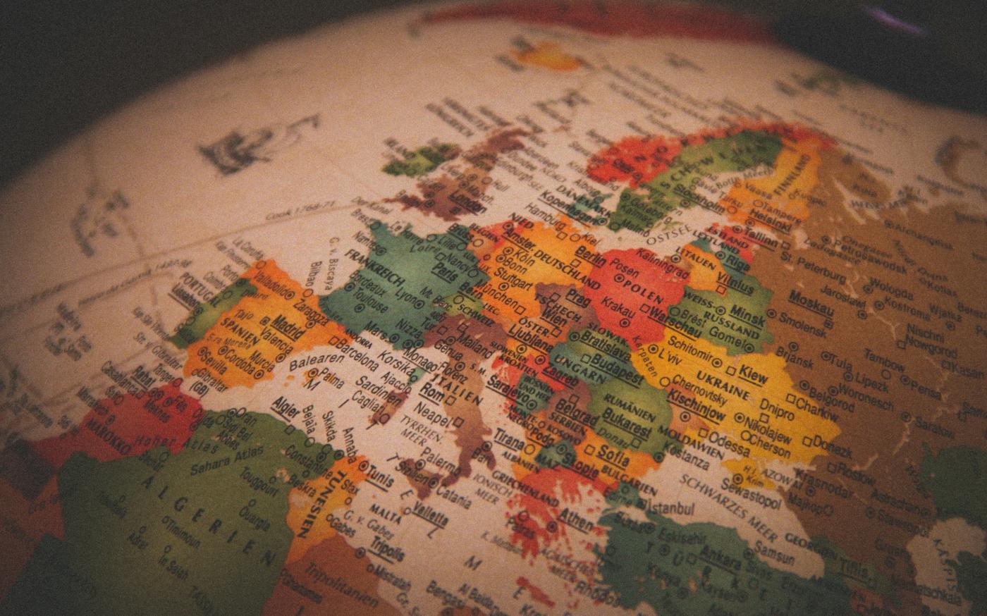 white red and green map by Christian Lue courtesy of Unsplash.