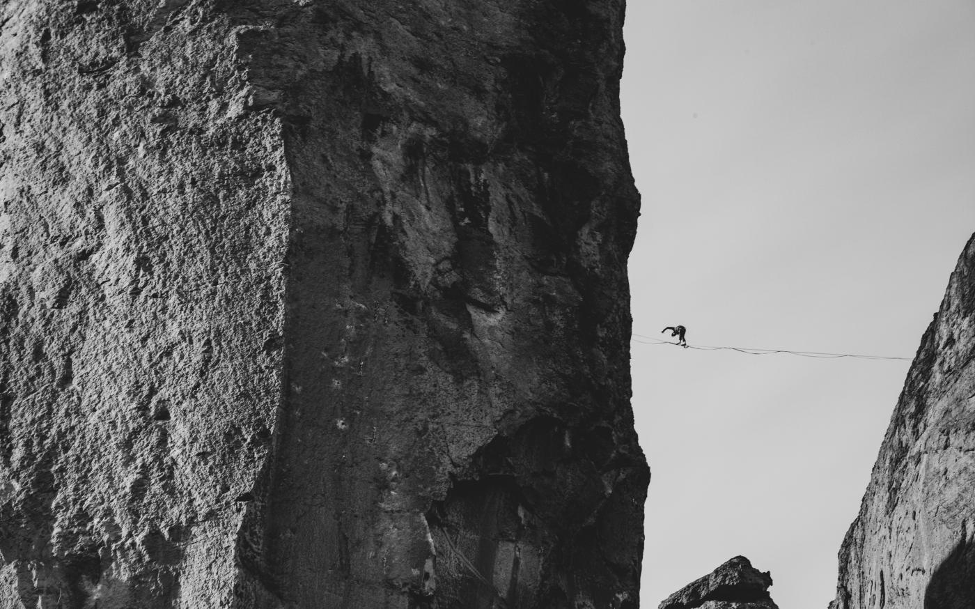 grayscale photo of rock formation by Sean Benesh courtesy of Unsplash.
