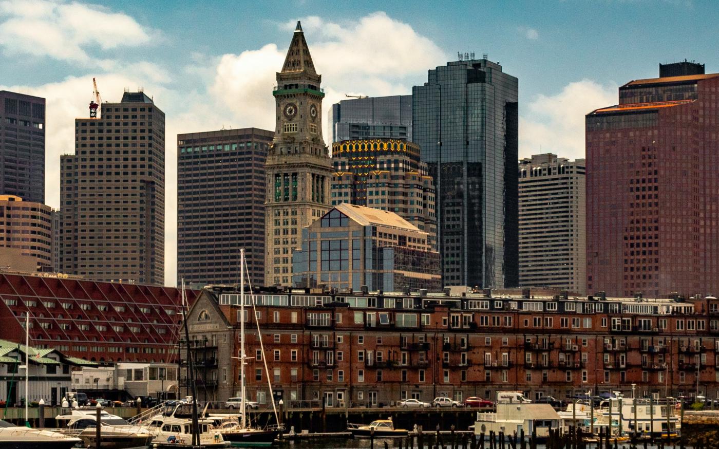 body of water near buildings at daytime by Ozzie Stern courtesy of Unsplash.