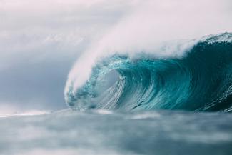 white and blue ocean waves by Matt Paul Catalano courtesy of Unsplash.