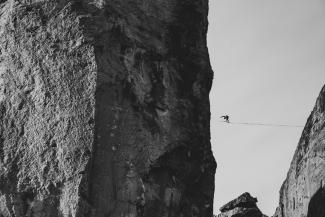grayscale photo of rock formation by Sean Benesh courtesy of Unsplash.