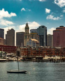 body of water near buildings at daytime by Ozzie Stern courtesy of Unsplash.