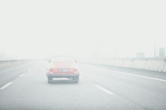 white car on road during daytime by laura adai courtesy of Unsplash.