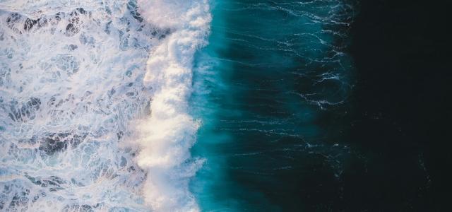 aerial view of sea by Ivan Bandura courtesy of Unsplash.