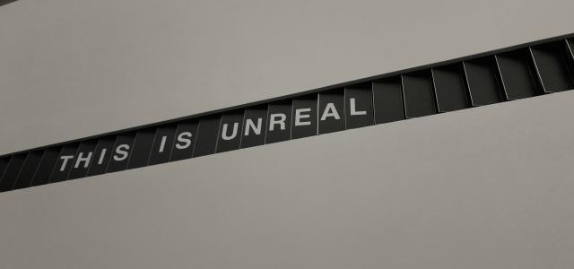 black and white kanji text by Andryck Lopez courtesy of Unsplash.