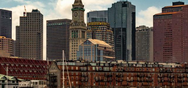 body of water near buildings at daytime by Ozzie Stern courtesy of Unsplash.