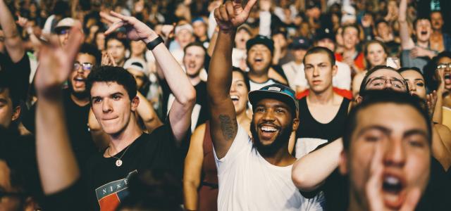 shallow focus photography of man in white shirt by Nicholas Green courtesy of Unsplash.