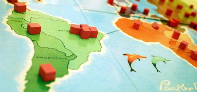 a close up of a board game on a table by Hal Gatewood courtesy of Unsplash.